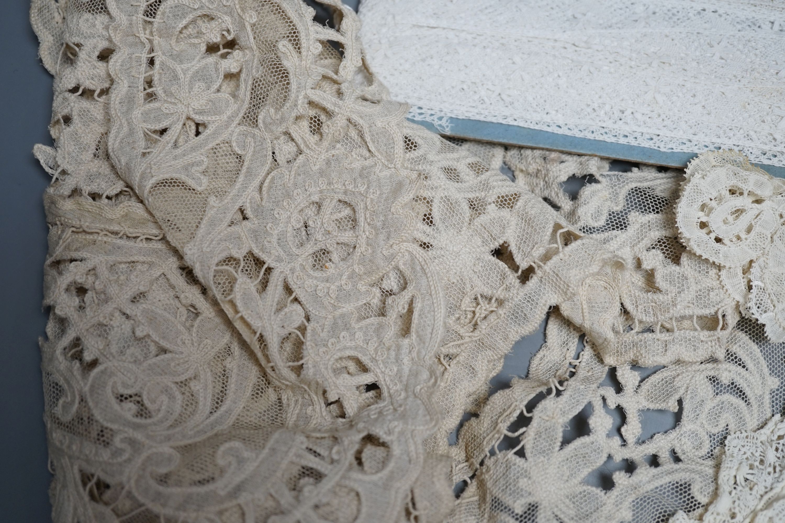 A lace bolero, a small collection of lace collars, trimmings etc